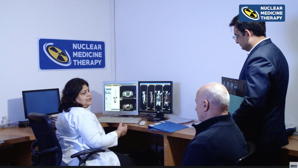Nuclear medicine physician reviewing medical images at FMRI, Gurugram